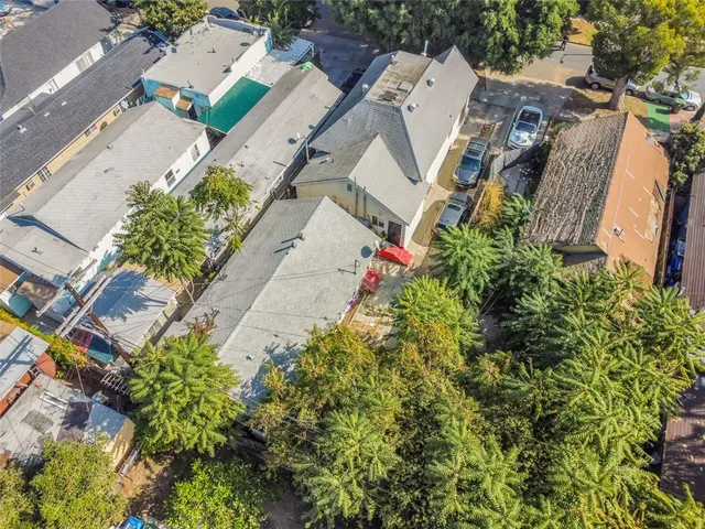 an aerial view of residential building and parking space