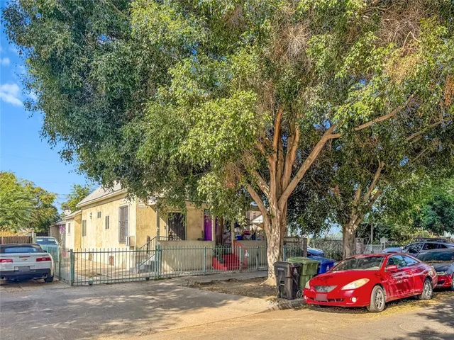 a car parked in front of a house