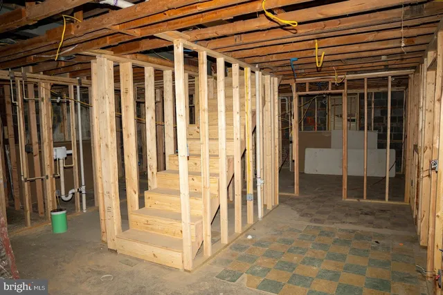 a view of entryway with a wooden door