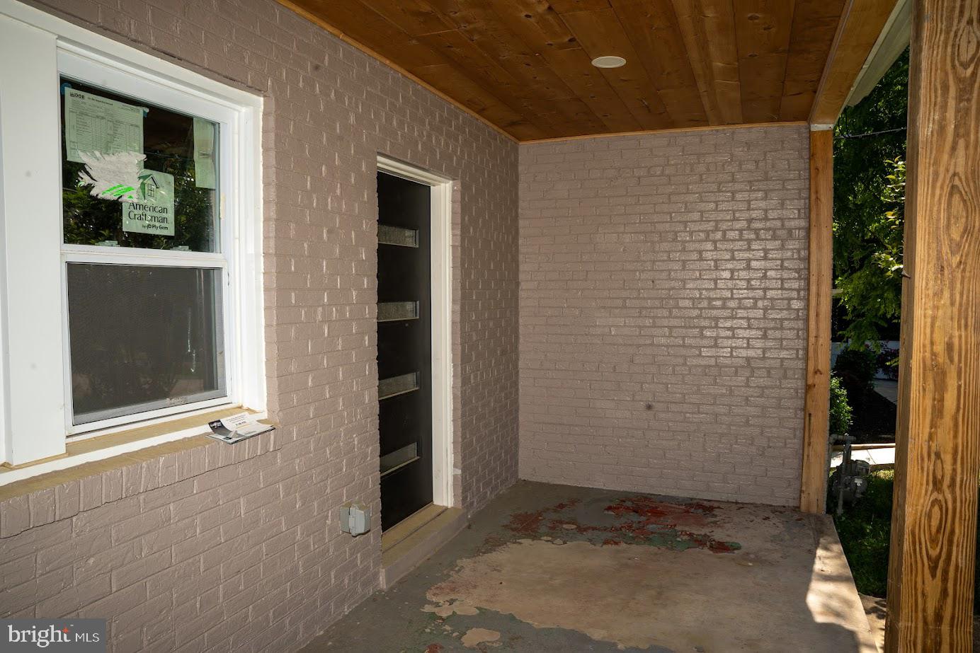 3704 Suitland Road Southeast Washington, DC 20020 - Photo 4 of 25 front view of a brick house