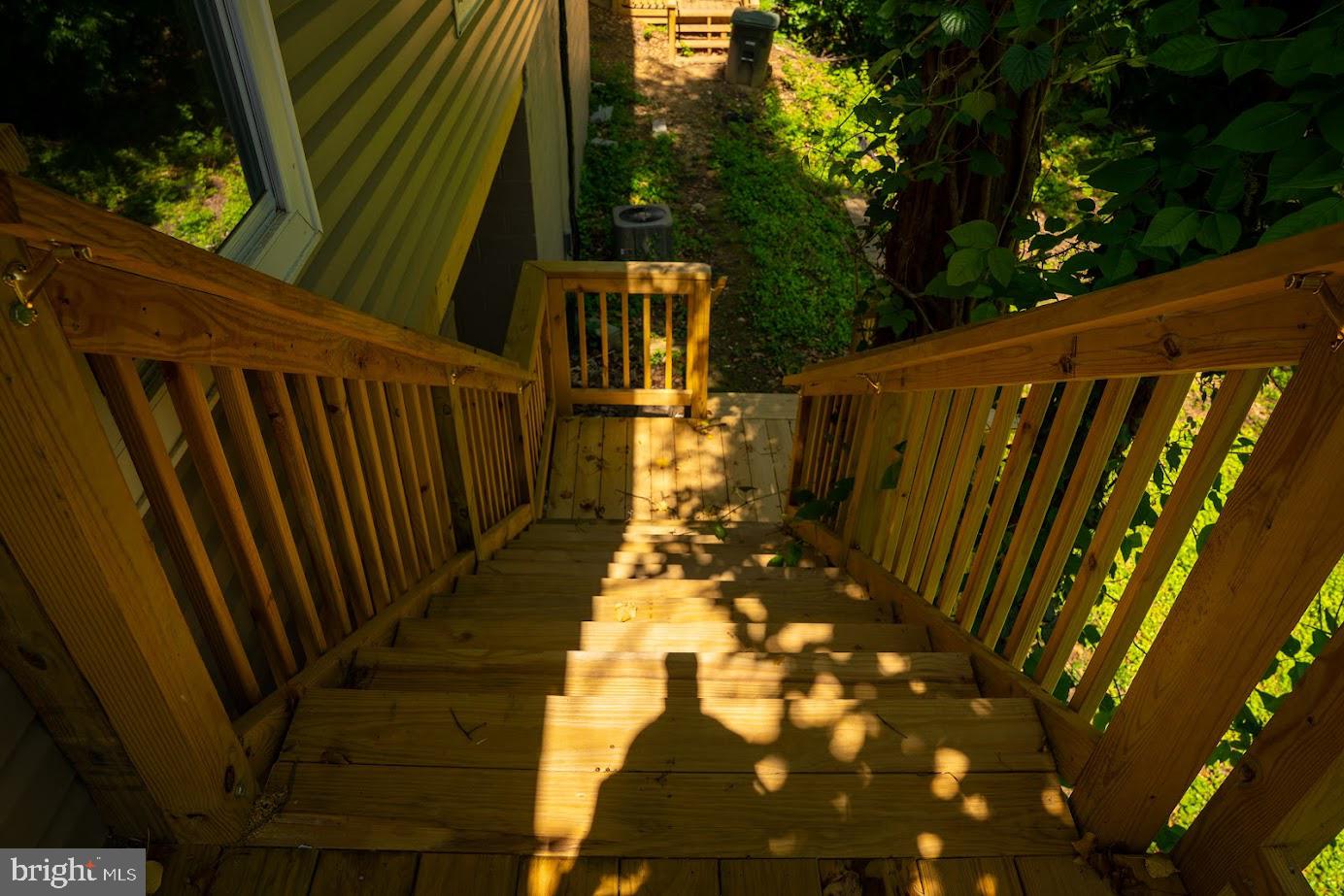 3704 Suitland Road Southeast Washington, DC 20020 - Photo 7 of 25 a view of balcony with wooden floor