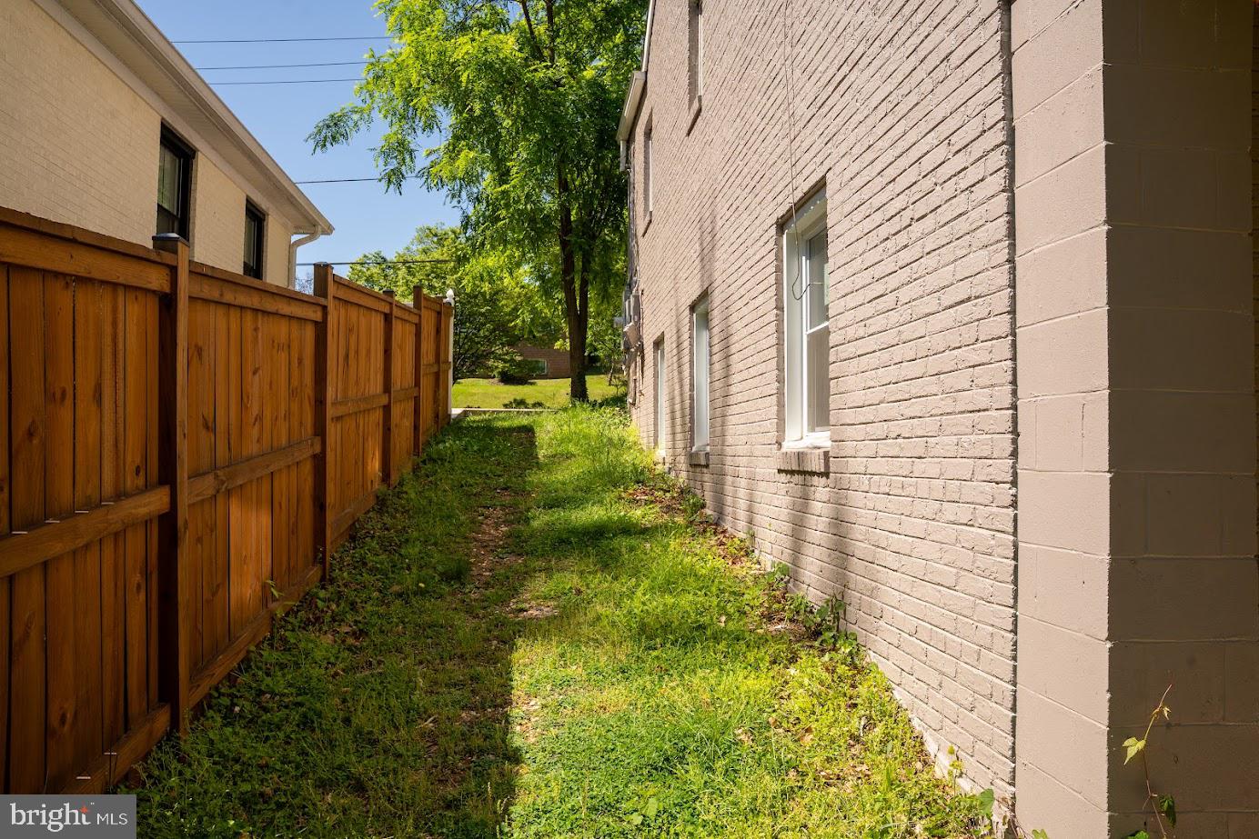 3704 Suitland Road Southeast Washington, DC 20020 - Photo 8 of 25 a view of backyard of house