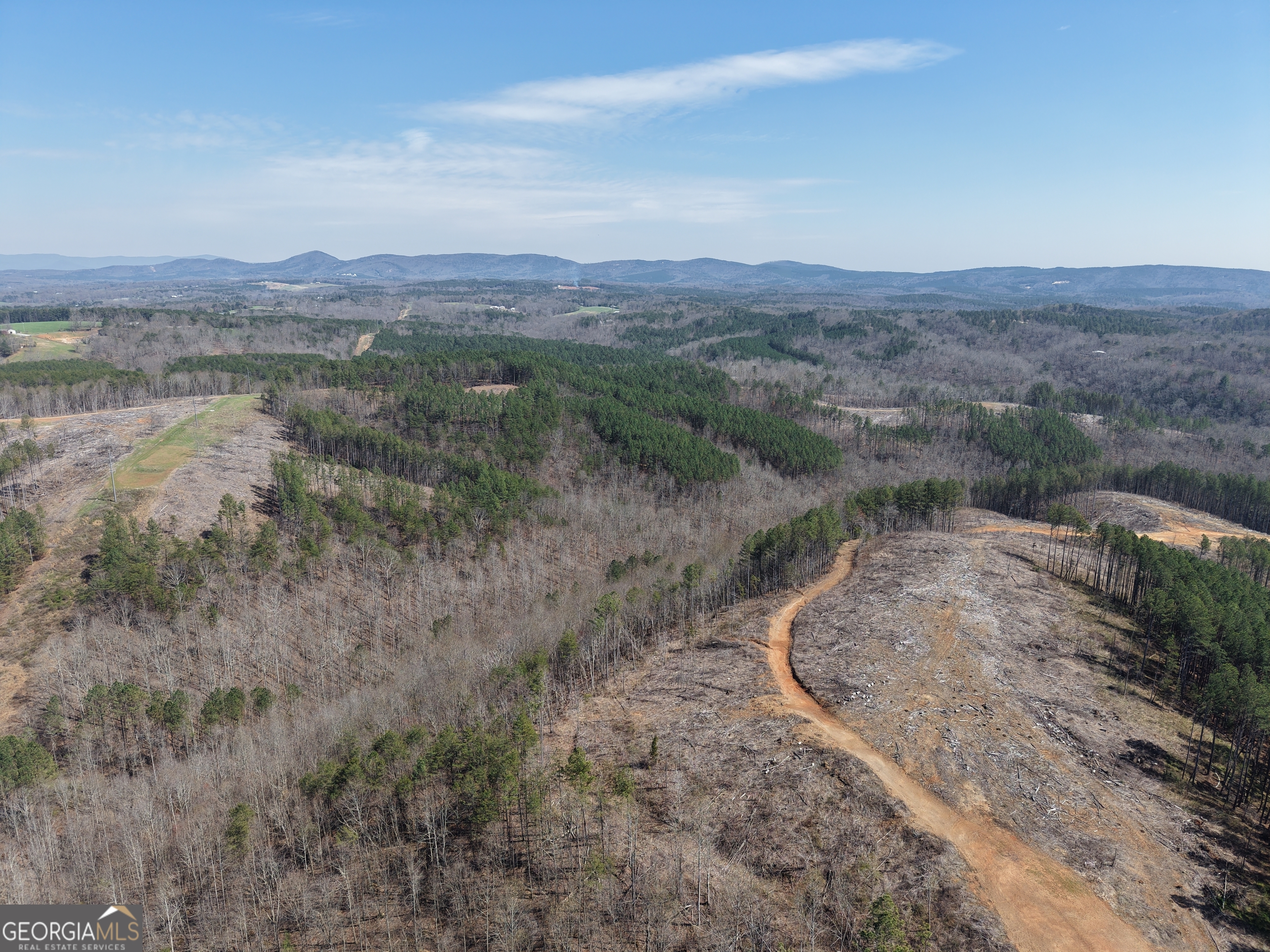 0 Angel Road, Unit 7206 PARCEL E Fairmount, GA 30139 - Photo 31 of 34 an aerial view of mountains with green space and fog