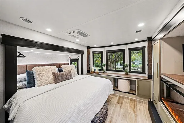 a view of a yard with a house in the background