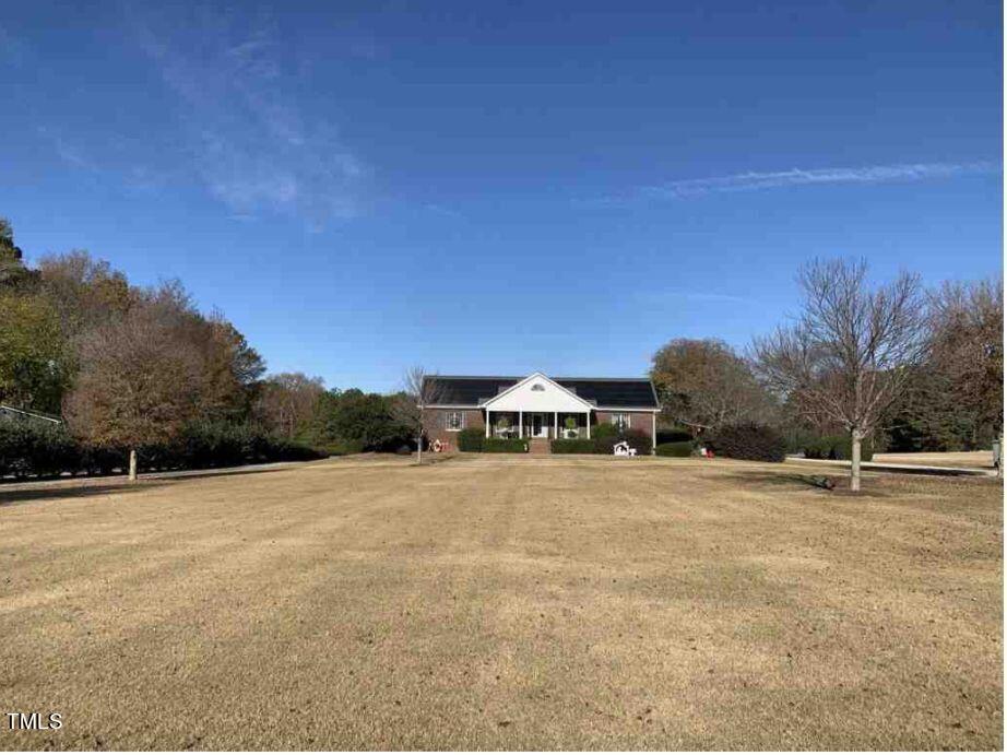 180 Loop Road Archer Lodge, NC 27527 - Photo 2 of 24 a view of an outdoor space and a yard