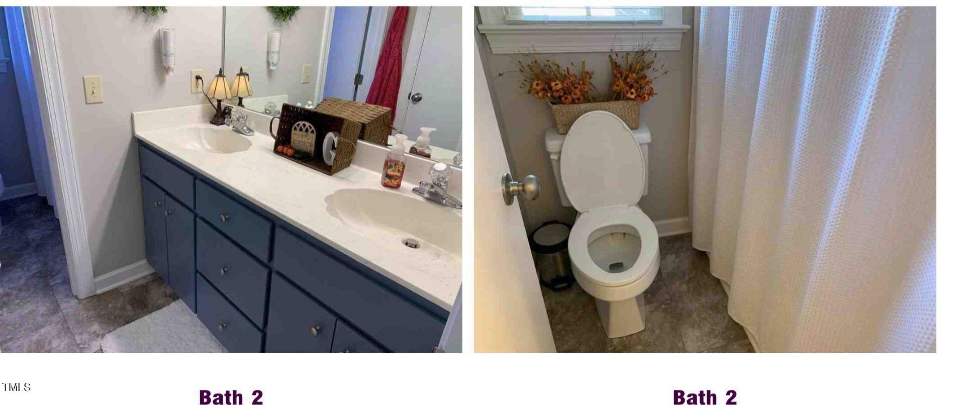 180 Loop Road Archer Lodge, NC 27527 - Photo 22 of 24 a bathroom with a sink and a mirror