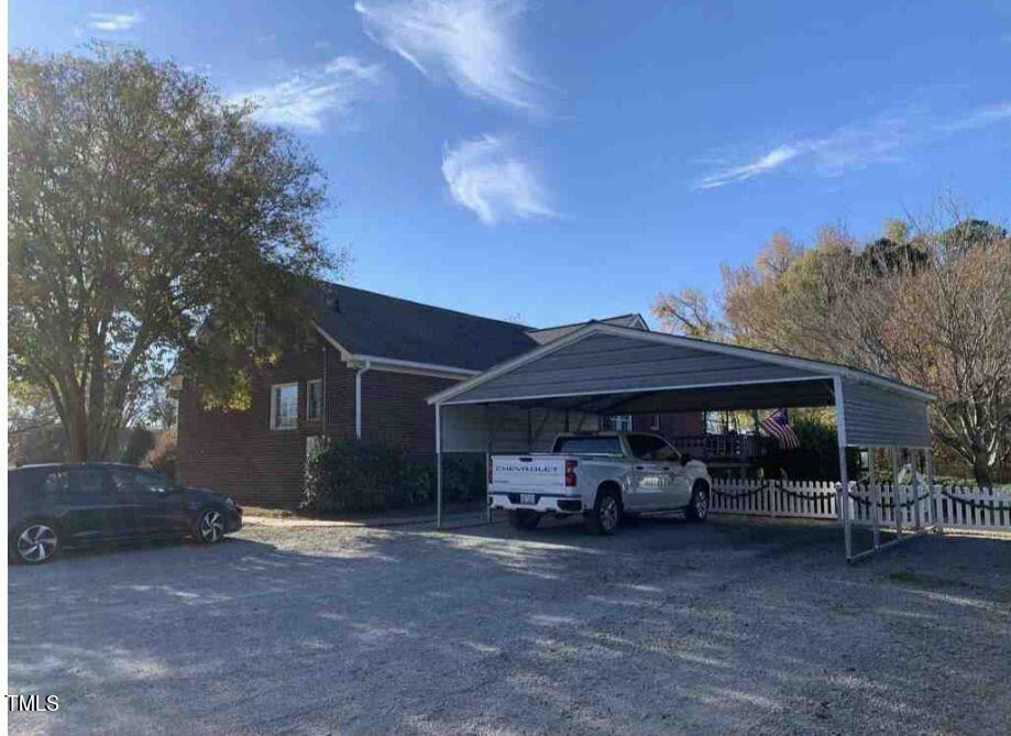 180 Loop Road Archer Lodge, NC 27527 - Photo 7 of 24 a view of street with parked cars
