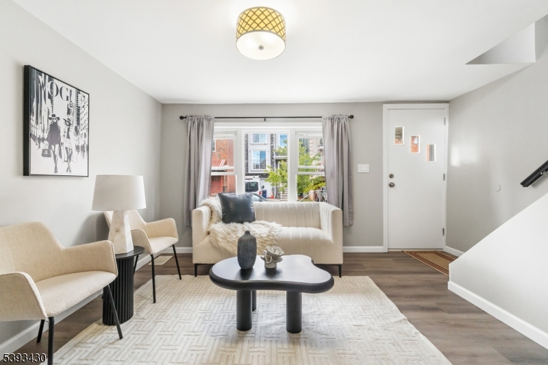 a living room with furniture and a table