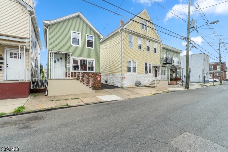 330 John Street Elizabeth, NJ 07202 - Photo 17 of 17 a view of a house with a patio