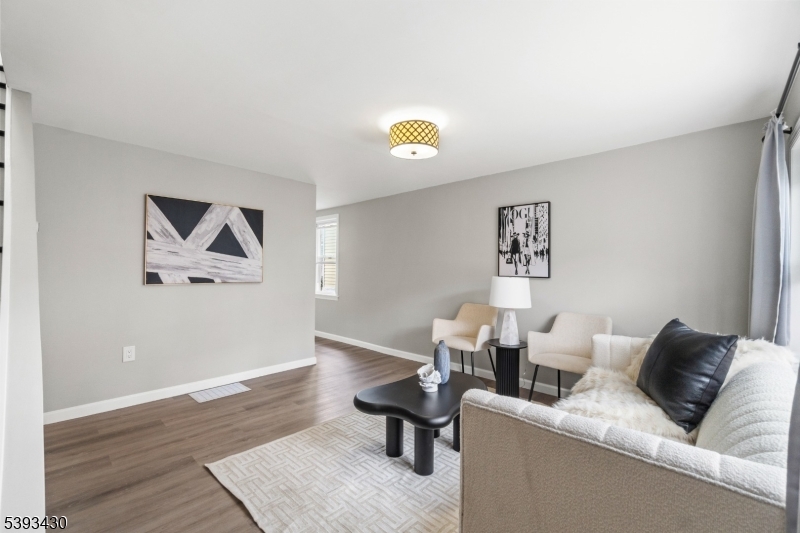 330 John Street Elizabeth, NJ 07202 - Photo 2 of 17 a living room with furniture and window