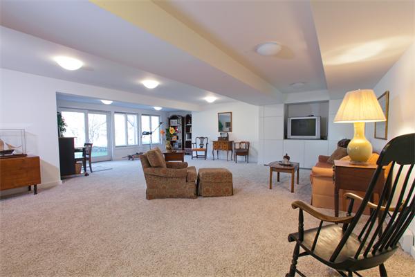 88 Crowell Farm Road Concord, MA 01742 - Photo 8 of 21 a living room with furniture dining table and a lamp