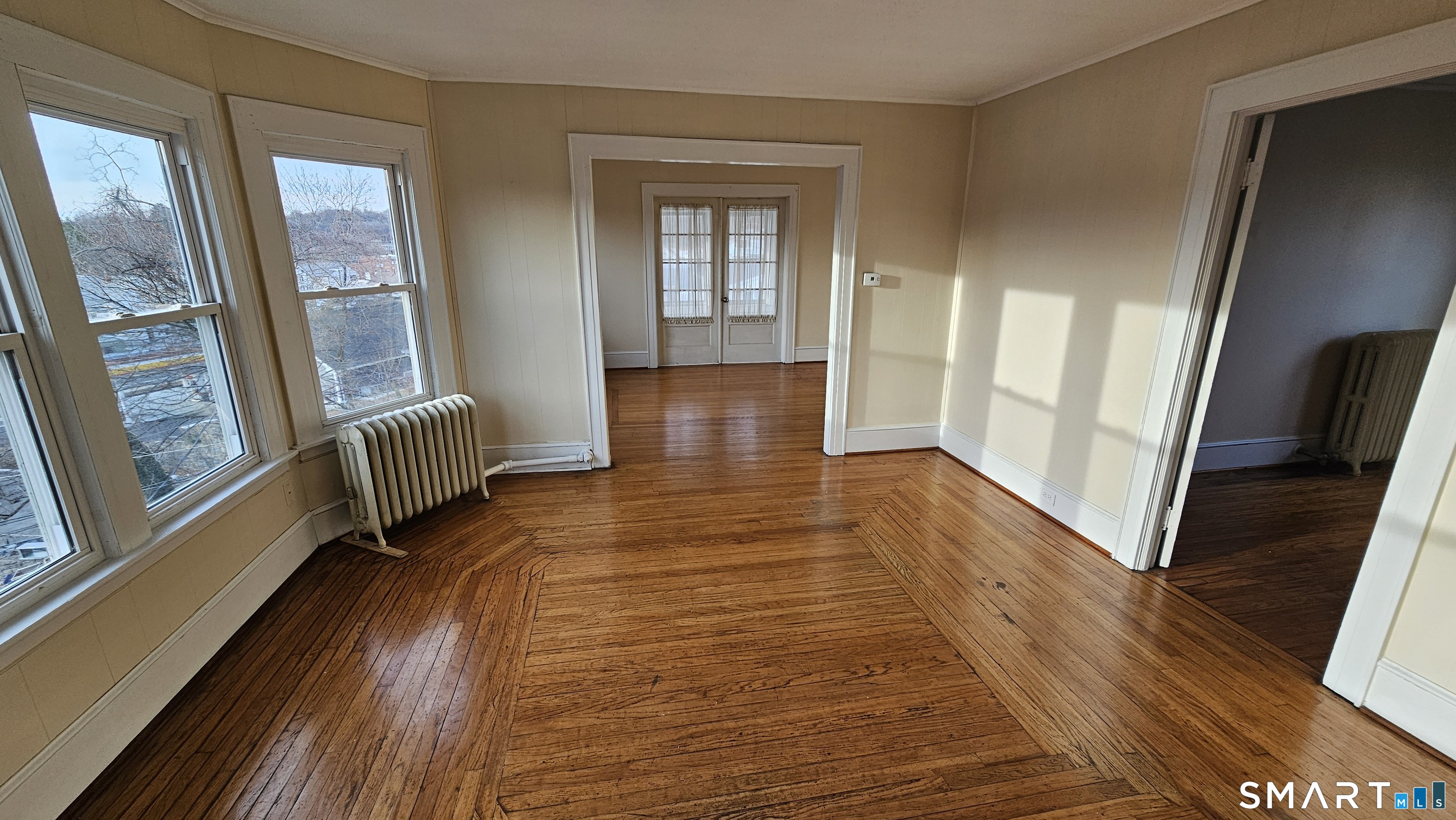 15 Bragaw Street, Unit 3 New London, CT 06320 - Photo 3 of 11 a view of outdoor space with wooden floor and windows