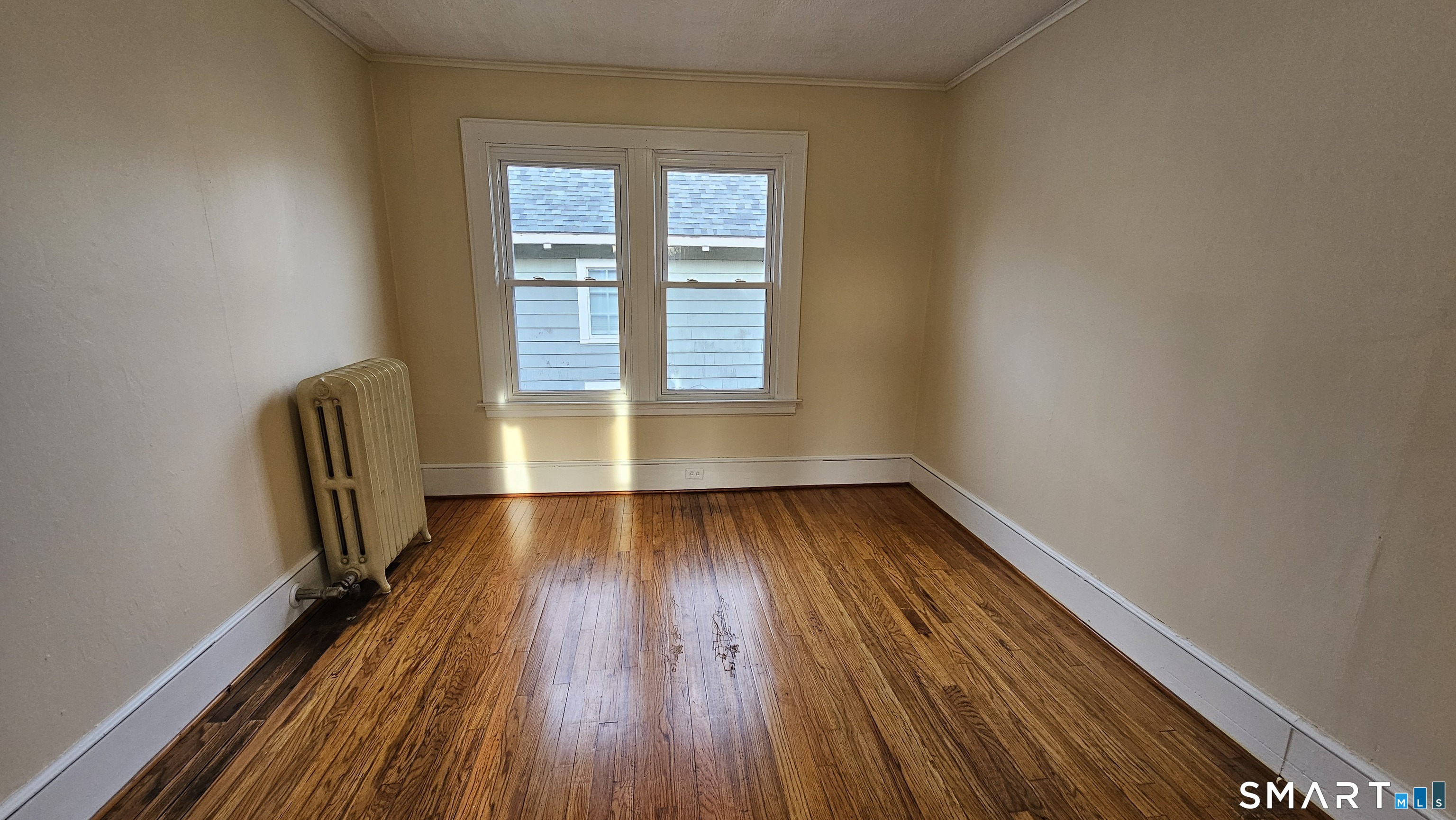 15 Bragaw Street, Unit 3 New London, CT 06320 - Photo 9 of 11 a view of wooden floor in a room