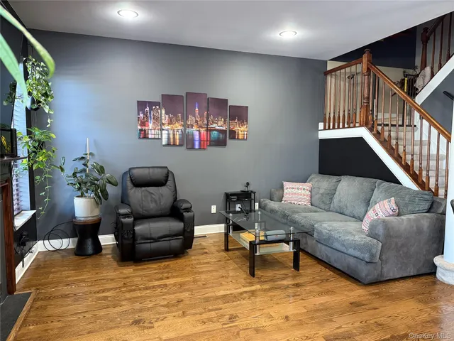 a kitchen with granite countertop a stove and a sink