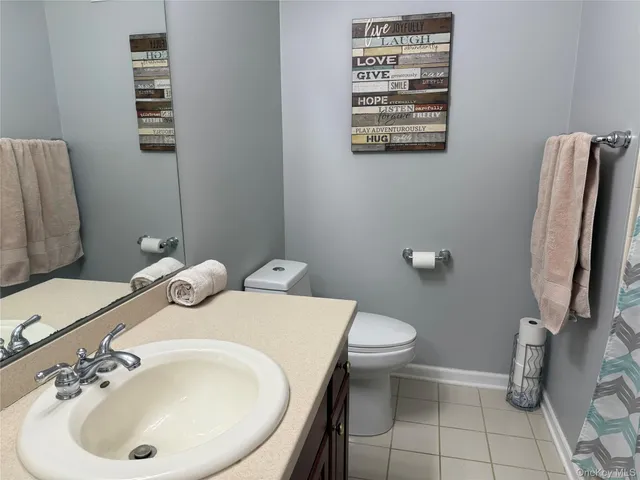 a room with furniture cabinets and window