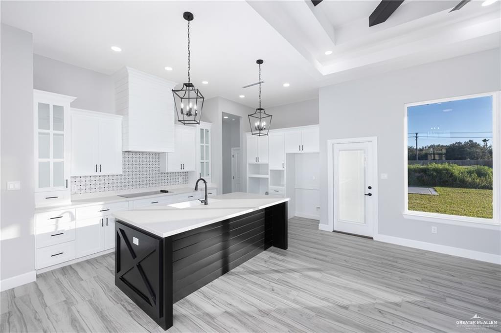 3304 East Rabbit Run Avenue Alton, TX 78573 - Photo 5 of 19 a spacious bathroom with a sink a large mirror and a shower