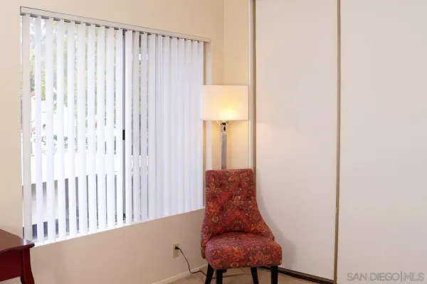 a living room with furniture and a gate