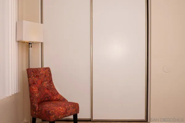 a utility room with furniture and a window