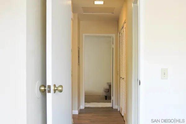 a view of a bathroom from a hallway