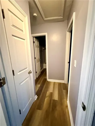 a bathroom with a sink a toilet a tub and shower