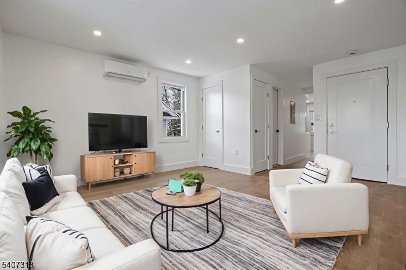 554 Hort Street Westfield, NJ 07090 - Photo 1 of 19 a living room with furniture and a flat screen tv