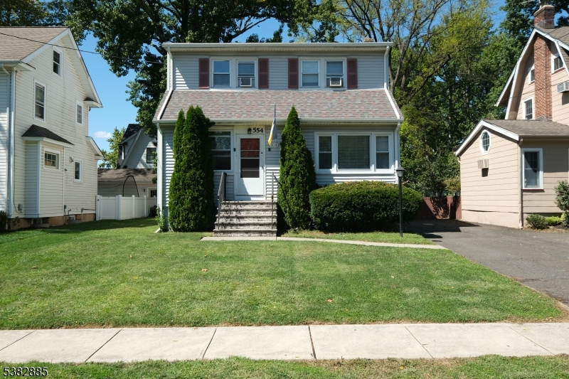 554 Hort Street Westfield, NJ 07090 - Photo 16 of 19 a view of a house with a yard