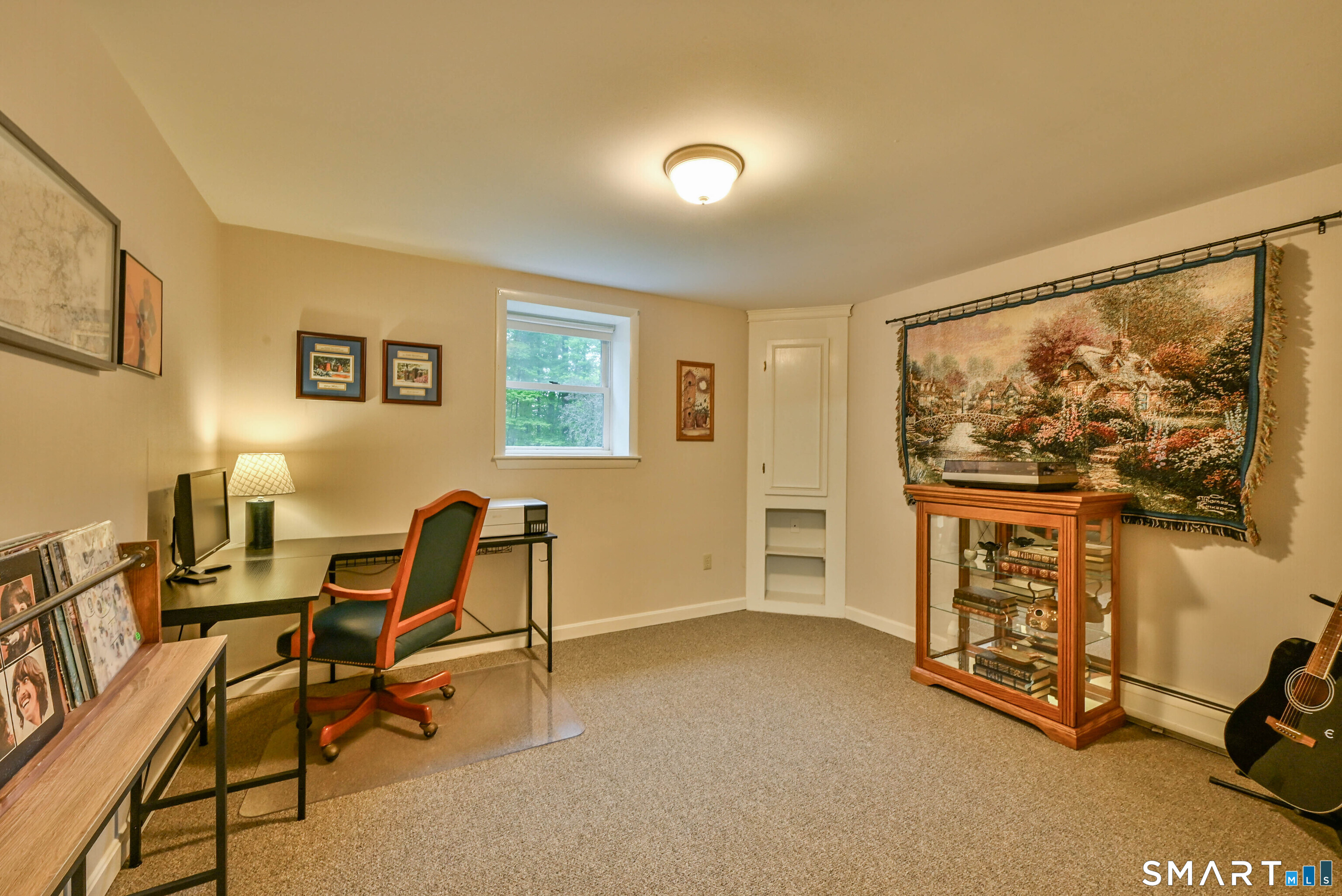 309 O'Leary Road Thompson, CT 06277 - Photo 34 of 40 a view of a livingroom with furniture and a flat screen tv