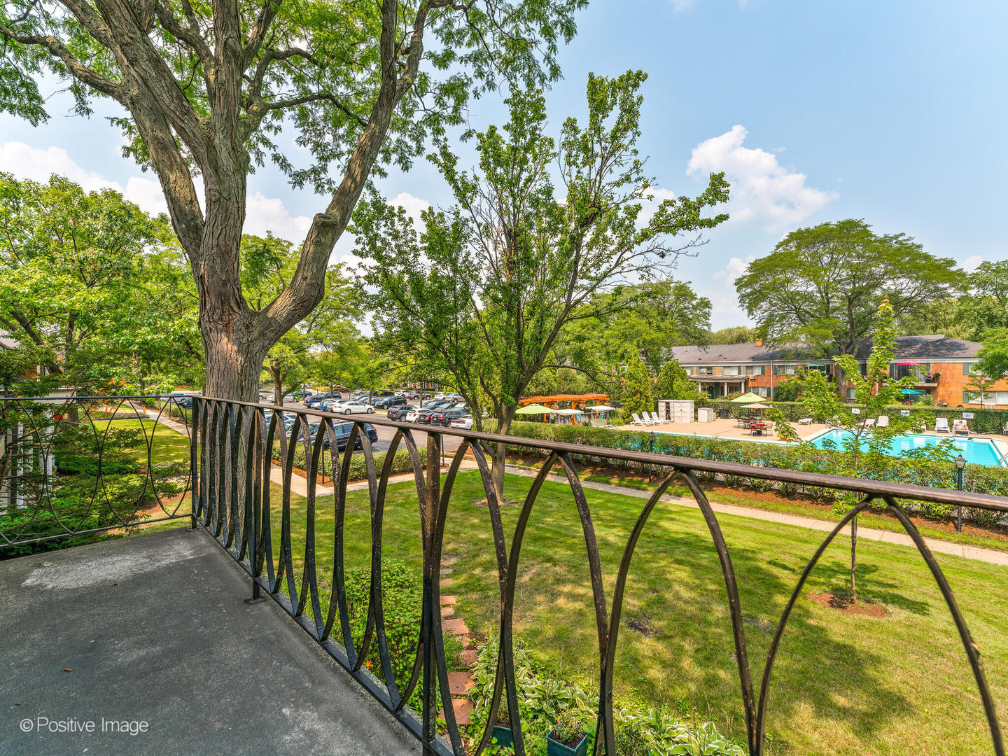 2407 South Goebbert Road, Unit 201 Arlington Heights, IL 60005 - Photo 17 of 20 a view of swimming pool from a balcony