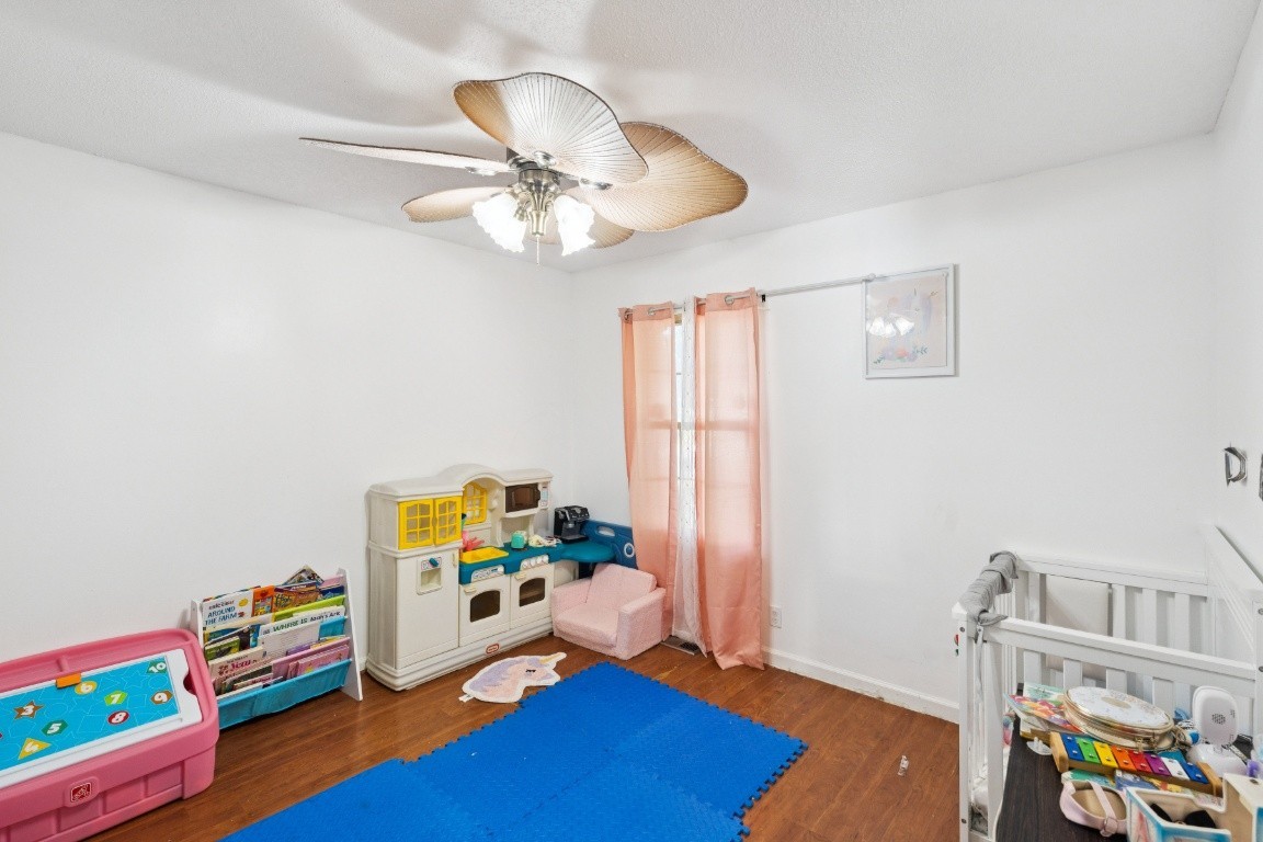 1544 Heritage View Boulevard Madison, TN 37115 - Photo 11 of 18 a bedroom with furniture and a book shelf