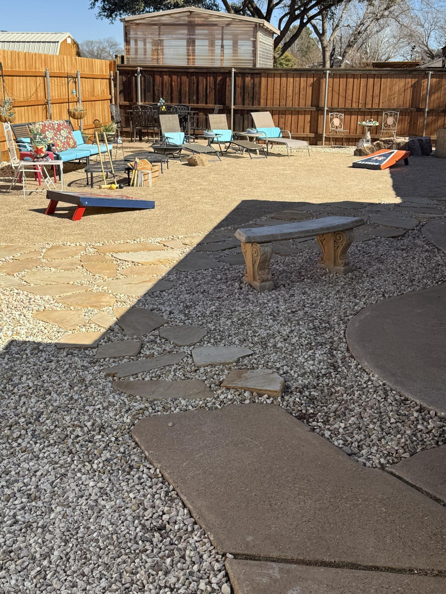 5722 75th Street Lubbock, TX 79424 - Photo 21 of 29 a view of a swimming pool with outdoor seating