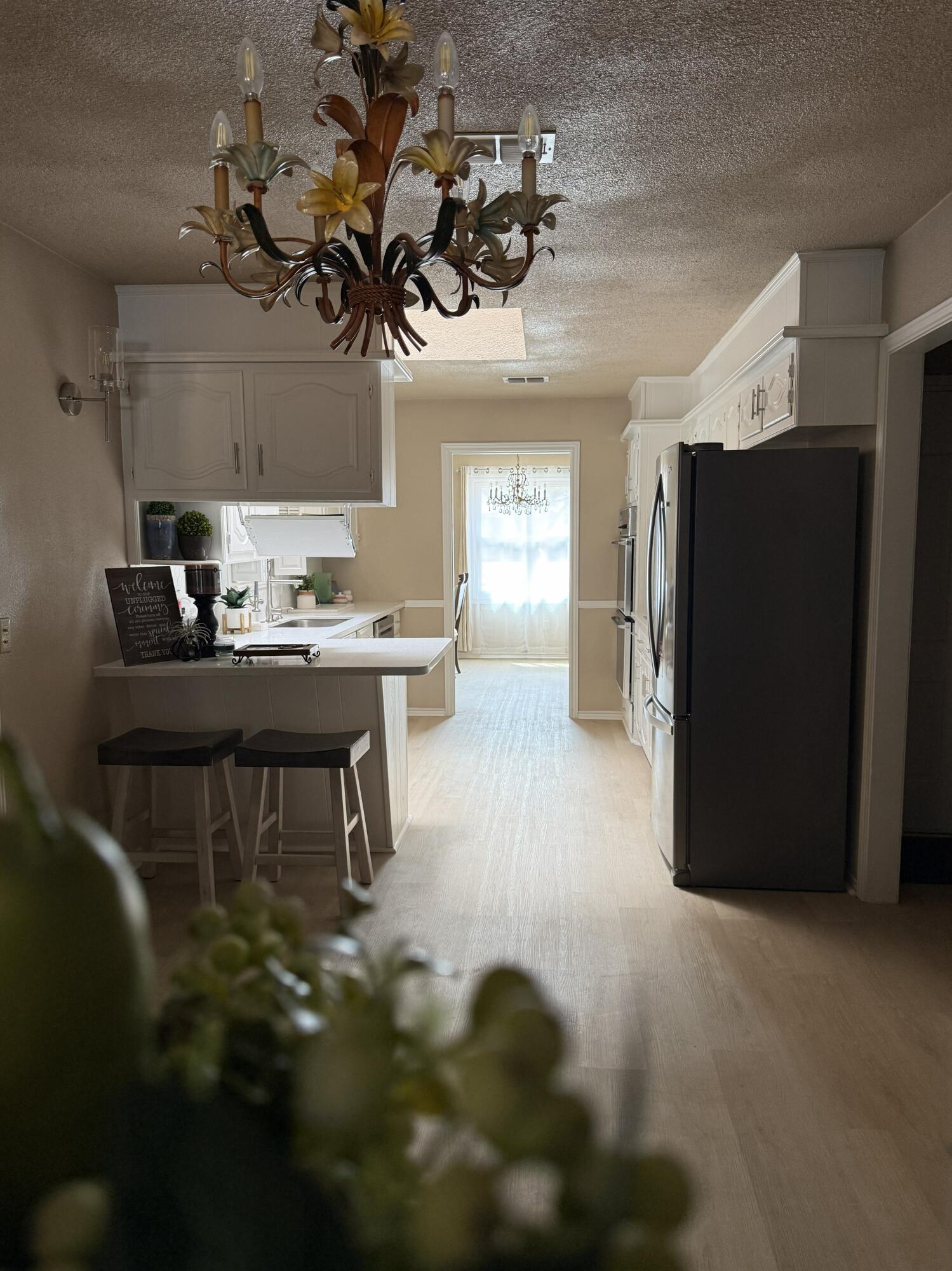 5722 75th Street Lubbock, TX 79424 - Photo 7 of 29 a view of a workspace with furniture