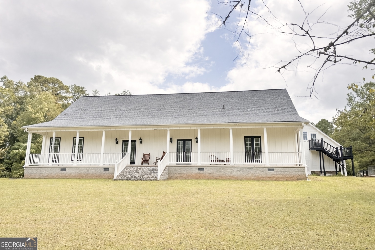919 West Milner Road Concord, GA 30206 - Photo 9 of 40 a front view of house with yard and trees around