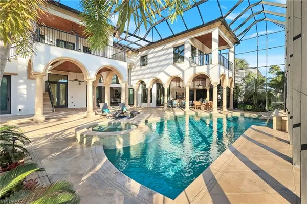 a view of a building with a swimming pool