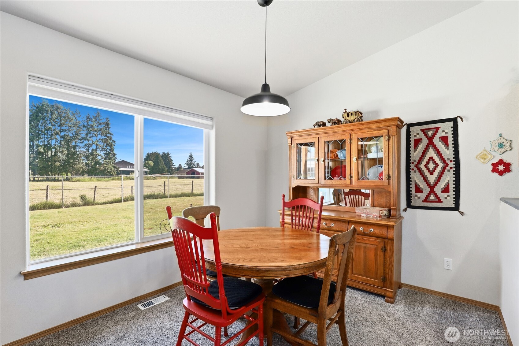 8008 188th Avenue Southwest Rochester, WA 98579 - Photo 11 of 40 a dining room with furniture window wooden floor