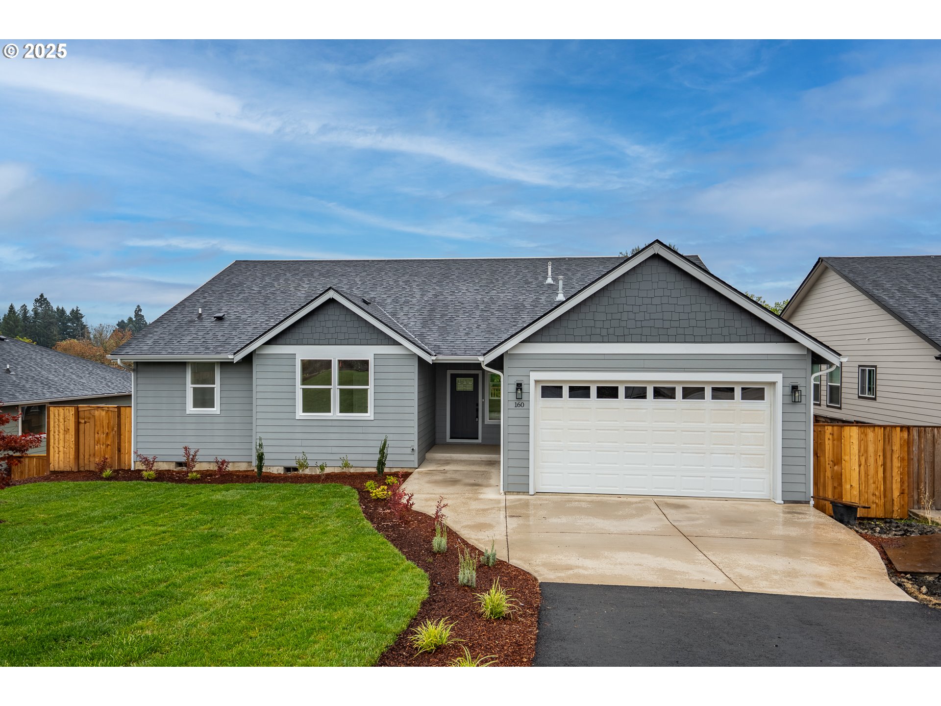 a view of a yard in front of a house