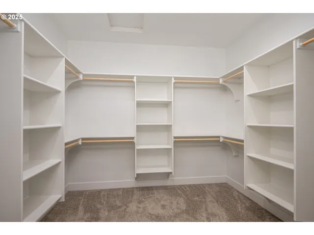 a room with cabinets and a wooden floor