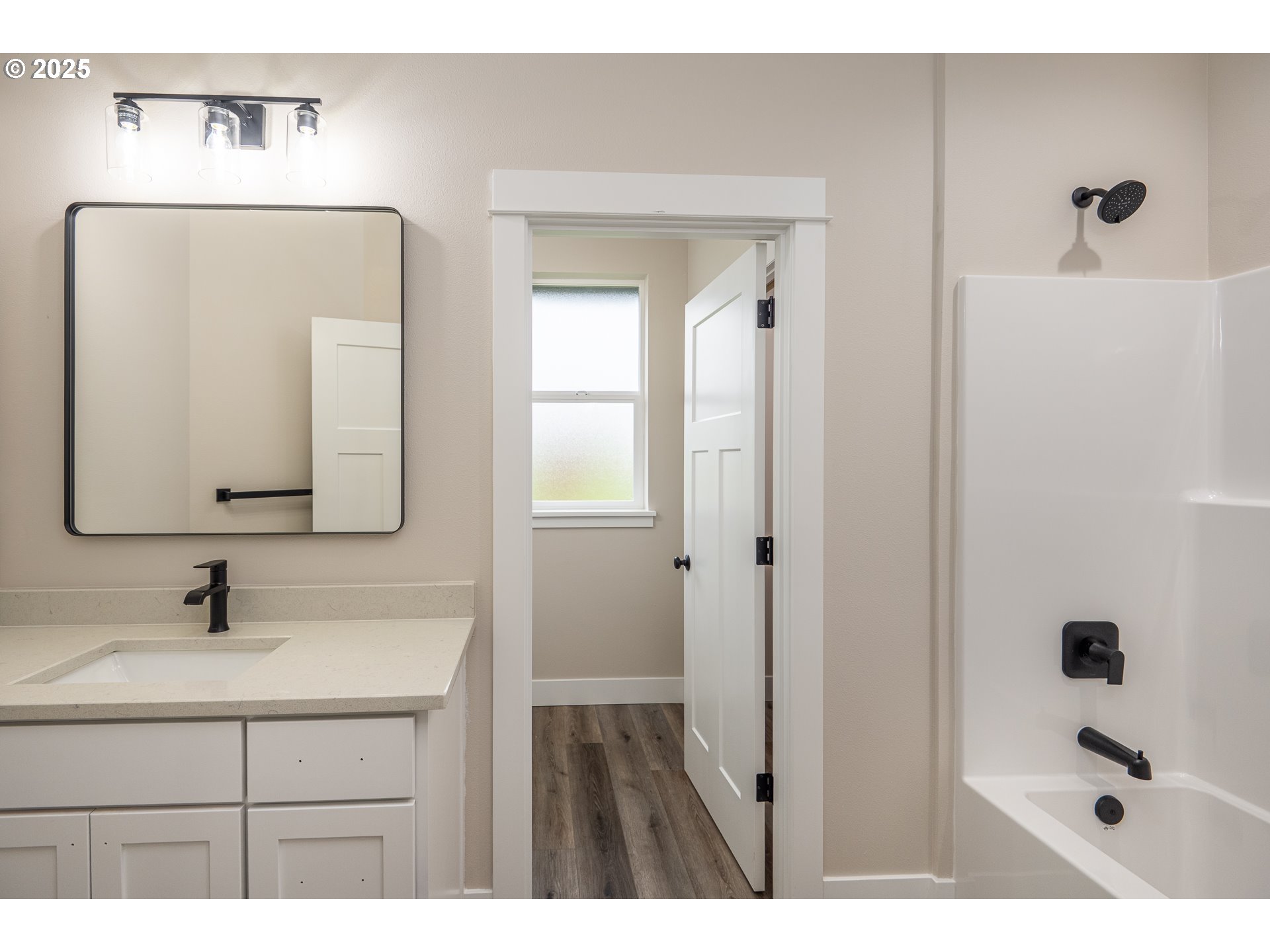 160 Wil Way Winston, OR 97496 - Photo 29 of 37 a bathroom with a sink a mirror and shower