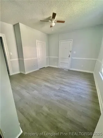 a view of a livingroom with a hardwood