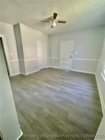 a view of a livingroom with a hardwood