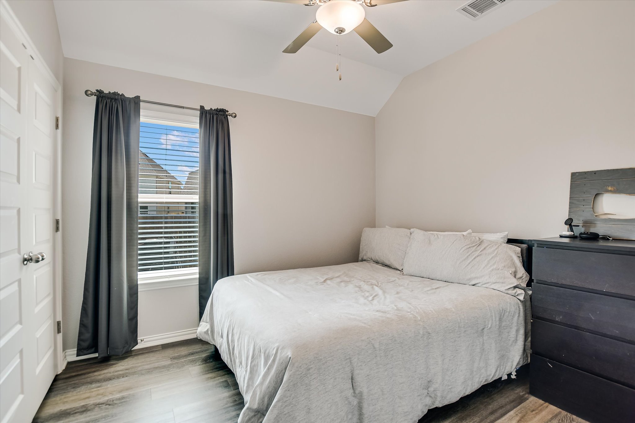 1101 Terrace View Drive Georgetown, TX 78628 - Photo 14 of 20 Bedroom featuring lofted ceiling, wood finished floors, and a ceiling fan