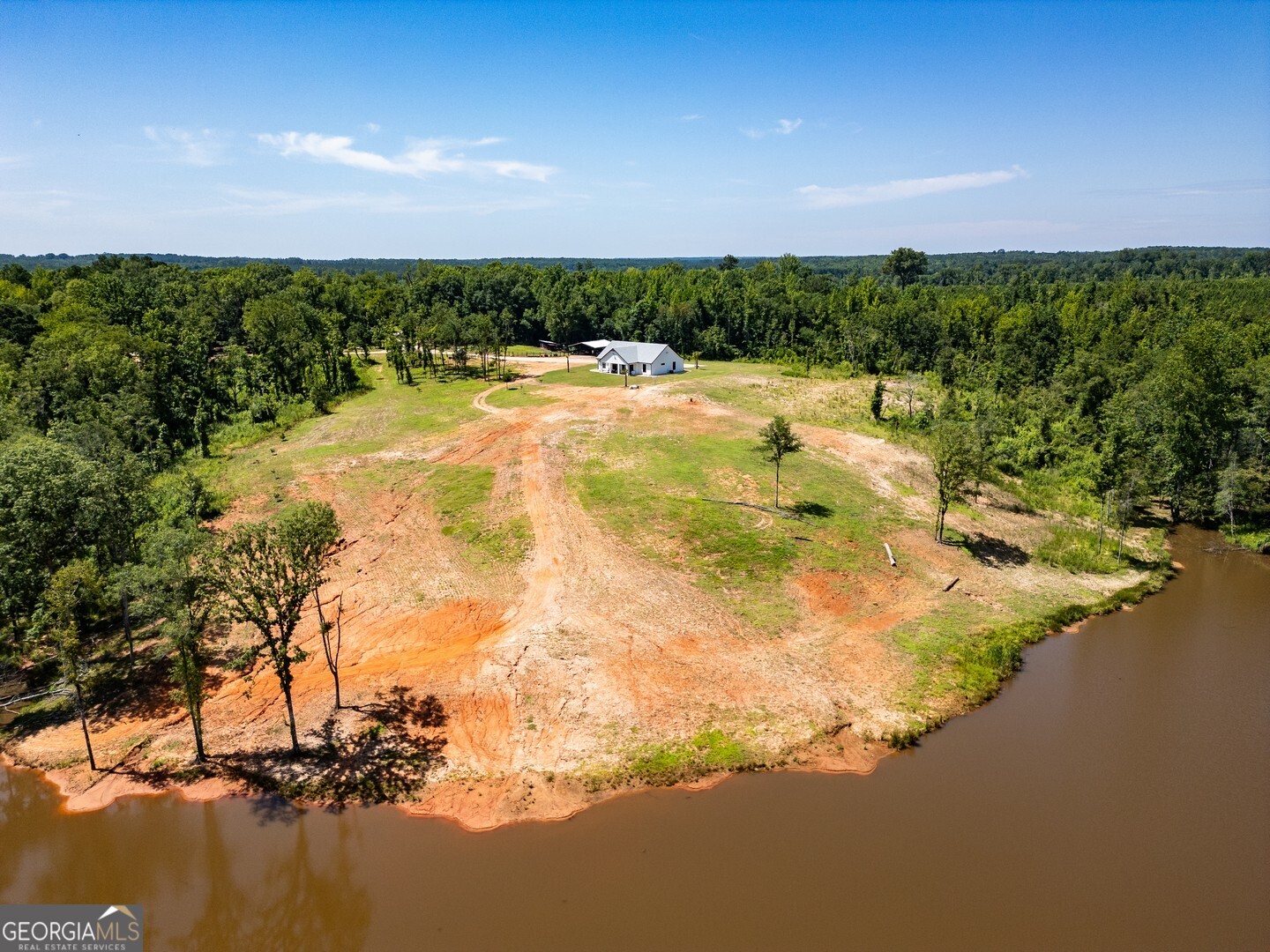 4348 Marshall Stewart Road Southwest Crawfordville, GA 30631 - Photo 42 of 120 a view of a lake with a city