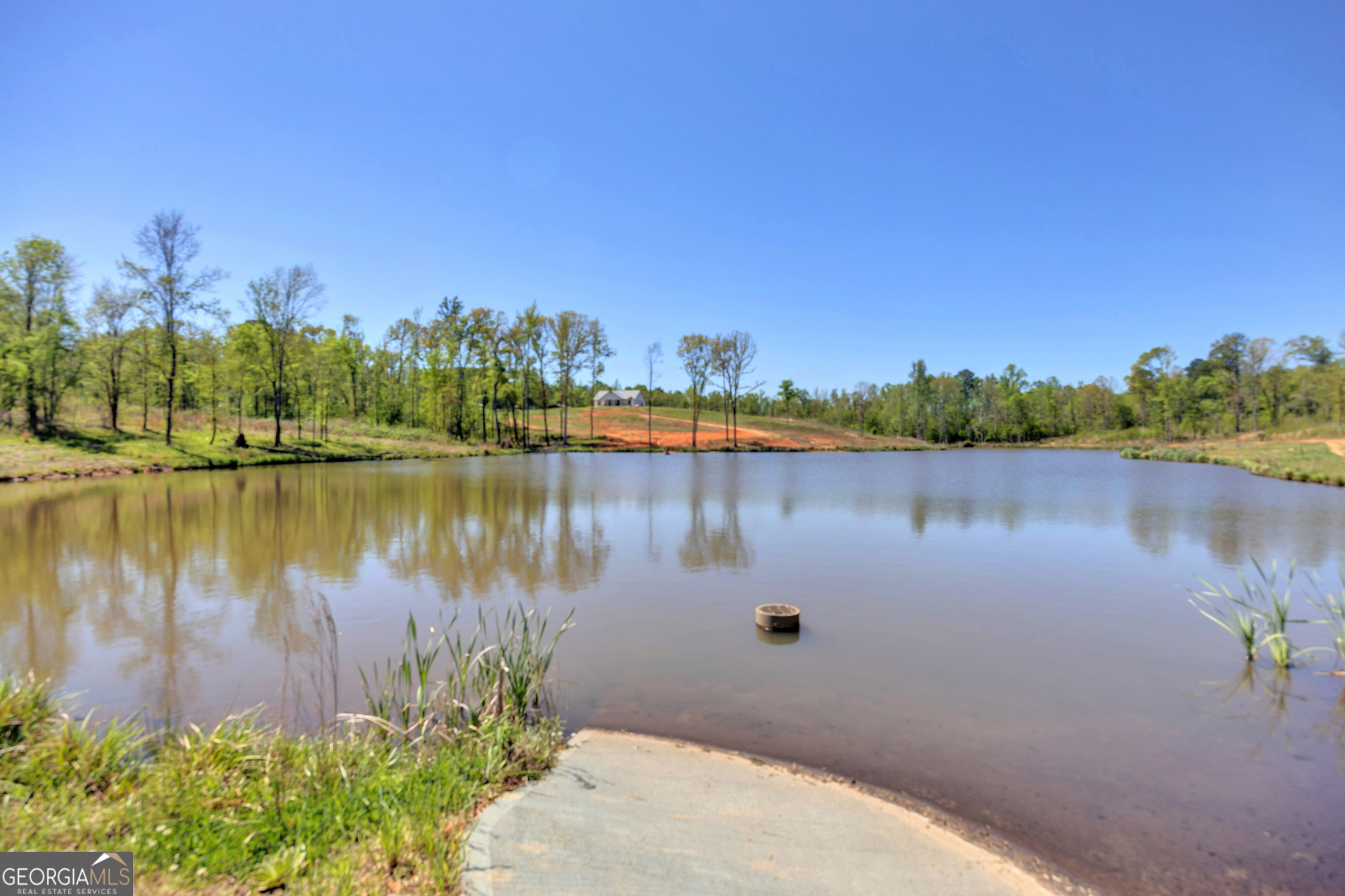 4348 Marshall Stewart Road Southwest Crawfordville, GA 30631 - Photo 97 of 120 a view of a lake with houses in the back