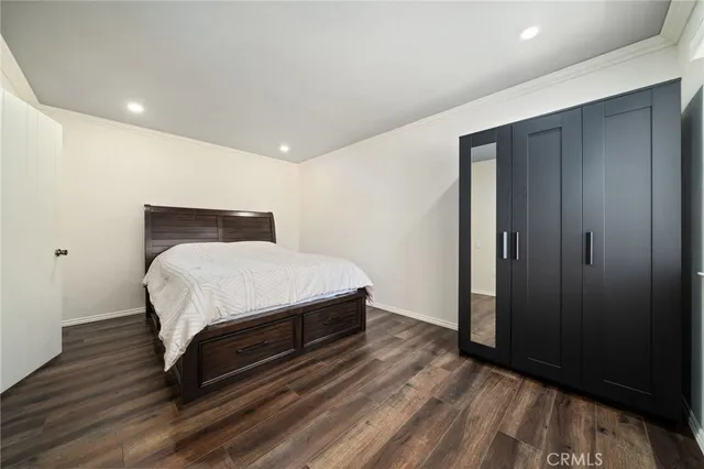 a large white bed in a white room