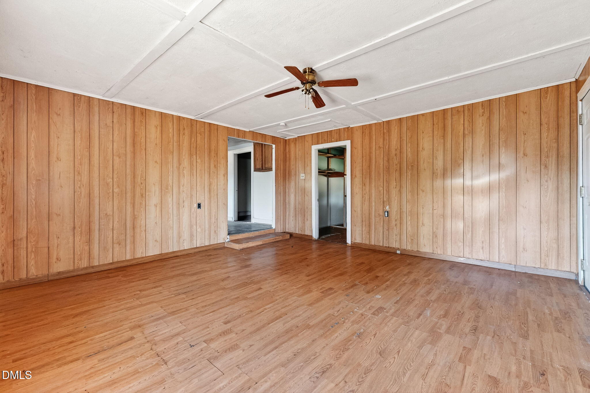 256 Stricklands Crossroads Road Four Oaks, NC 27524 - Photo 14 of 16 wooden floor in an empty room with a window