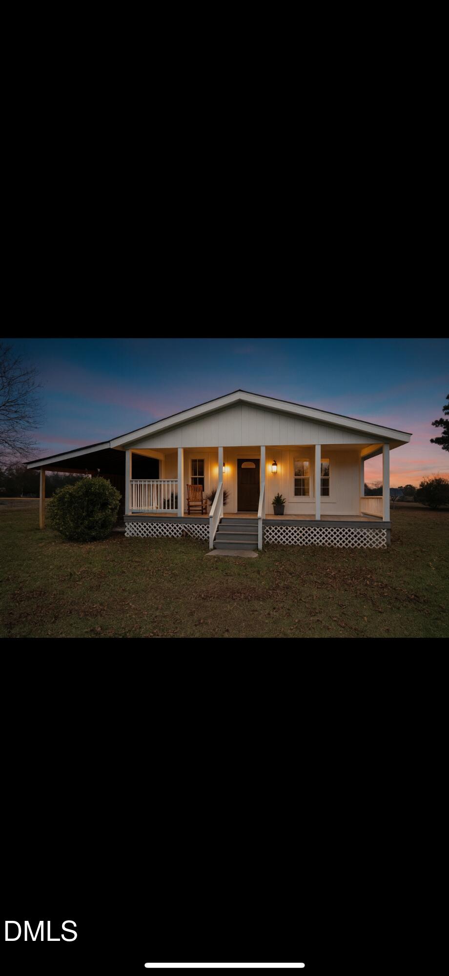 256 Stricklands Crossroads Road Four Oaks, NC 27524 - Photo 6 of 16 a front view of a house with a yard