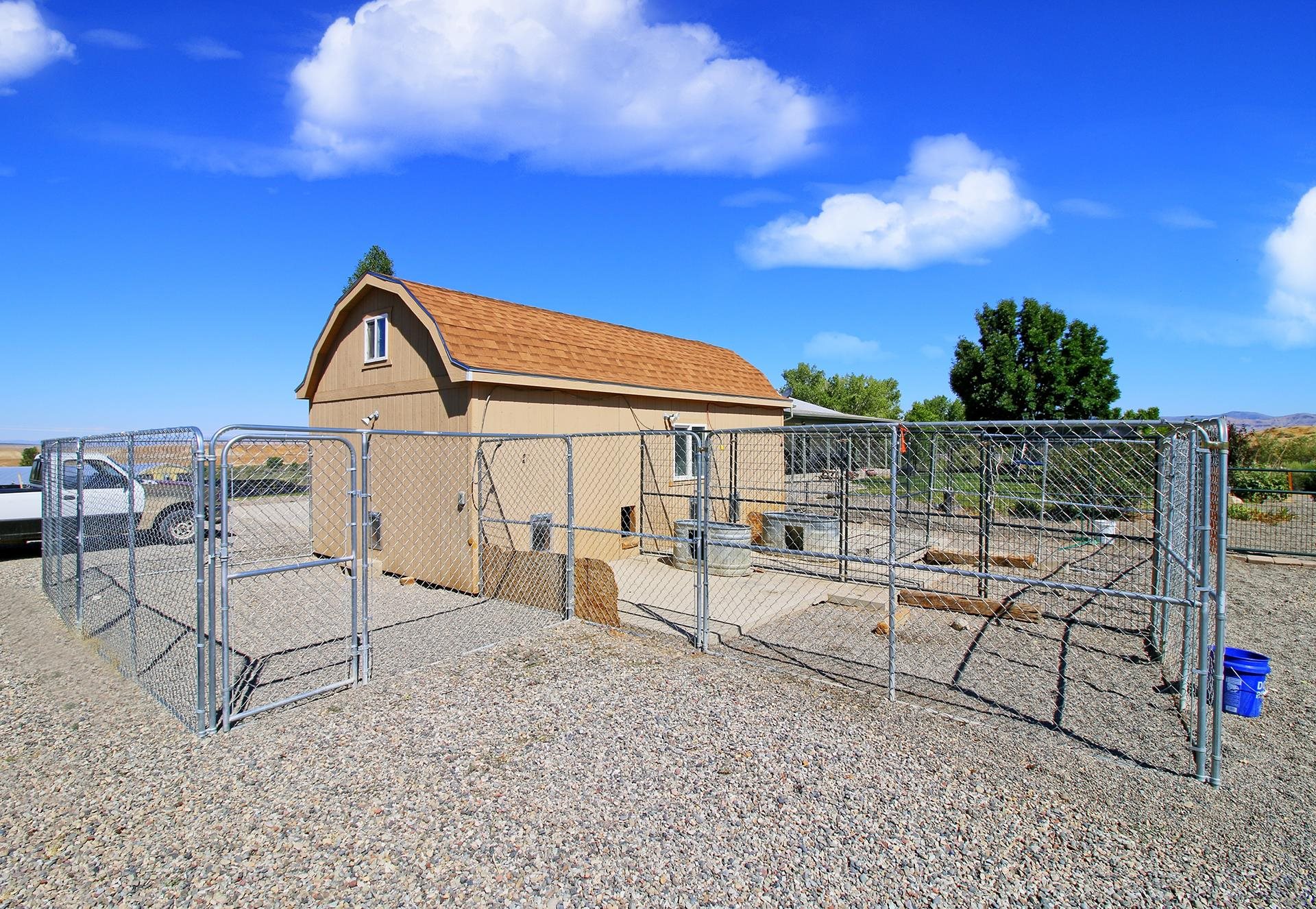 1742 10 Road Mack, CO 81525 - Photo 3 of 42 a view of a house with backyard and sitting area