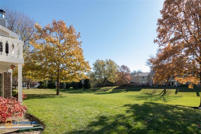 131 Century Court, Unit O2 Schaumburg, IL 60193 - Photo 15 of 16 a view of a house with a yard