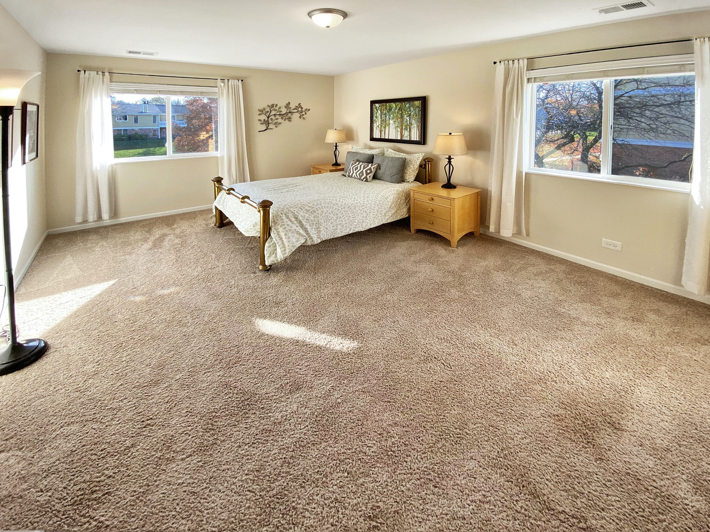 131 Century Court, Unit O2 Schaumburg, IL 60193 - Photo 7 of 16 a living room with furniture and a window with outer view