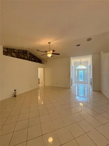 a kitchen with stainless steel appliances granite countertop a sink and a stove