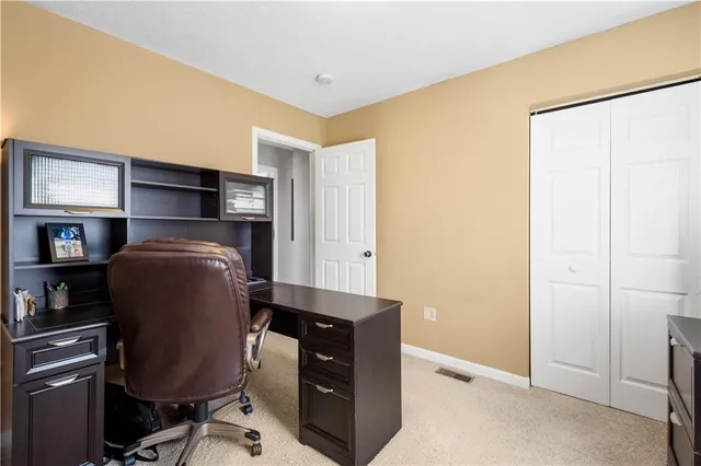 a view of workspace with cabinets